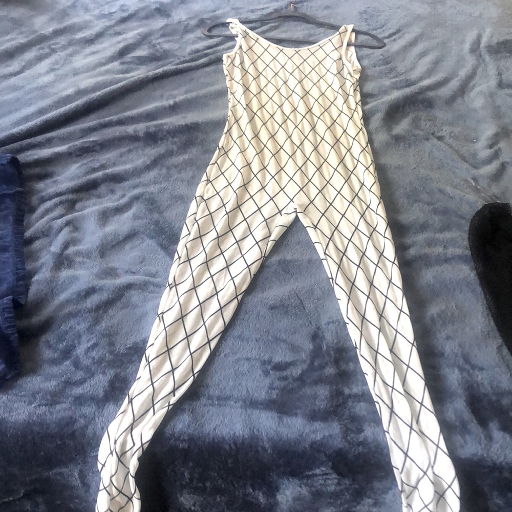 White jumpsuit with black lines. undergarment